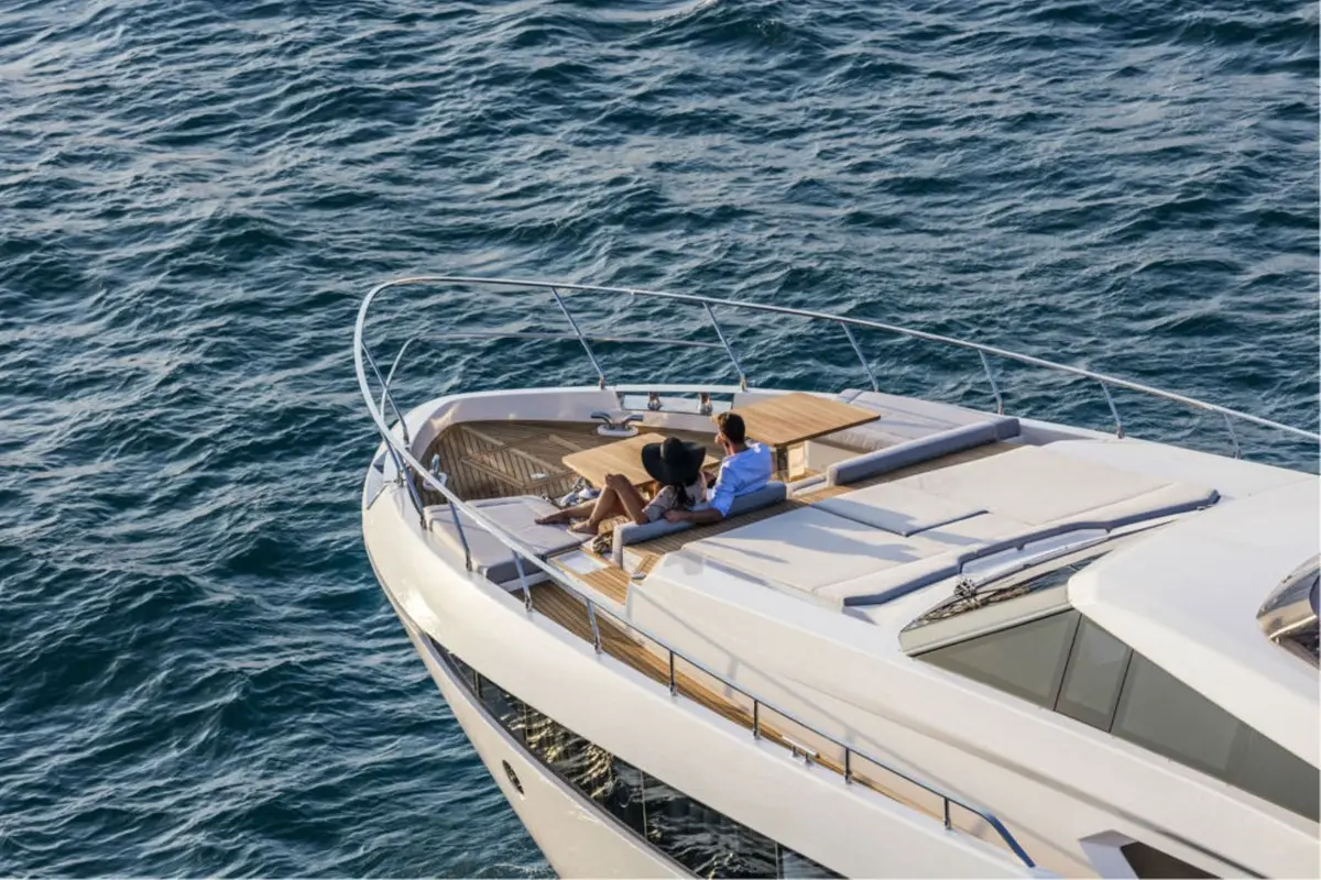 Ferretti 920, main deck — Luxury Yachts St. Tropez, Saint-Tropez. Gulf anchorage mornings, Pampelonne tender runs by afternoon