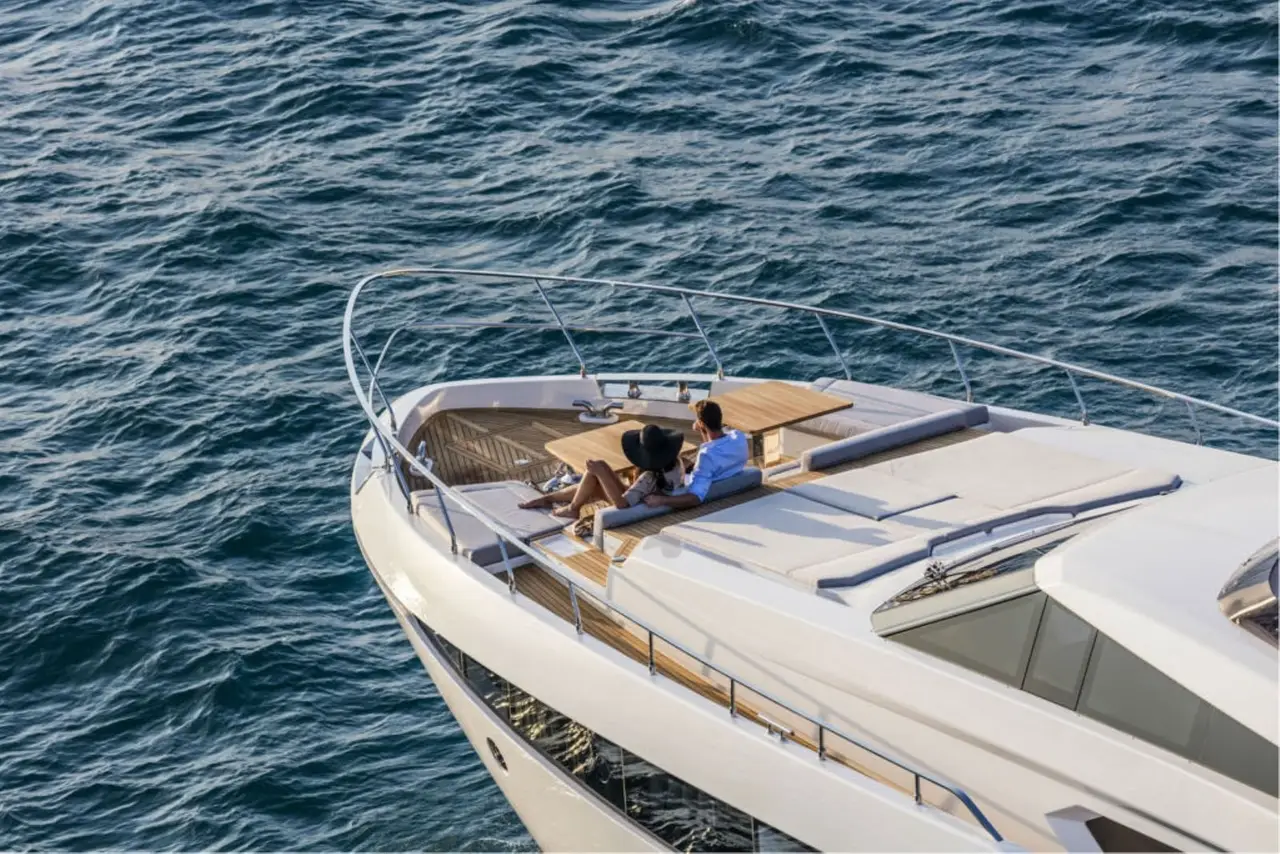 Ferretti 920, main deck — Luxury Yachts St. Tropez, Saint-Tropez. Gulf anchorage mornings, Pampelonne tender runs by afternoon