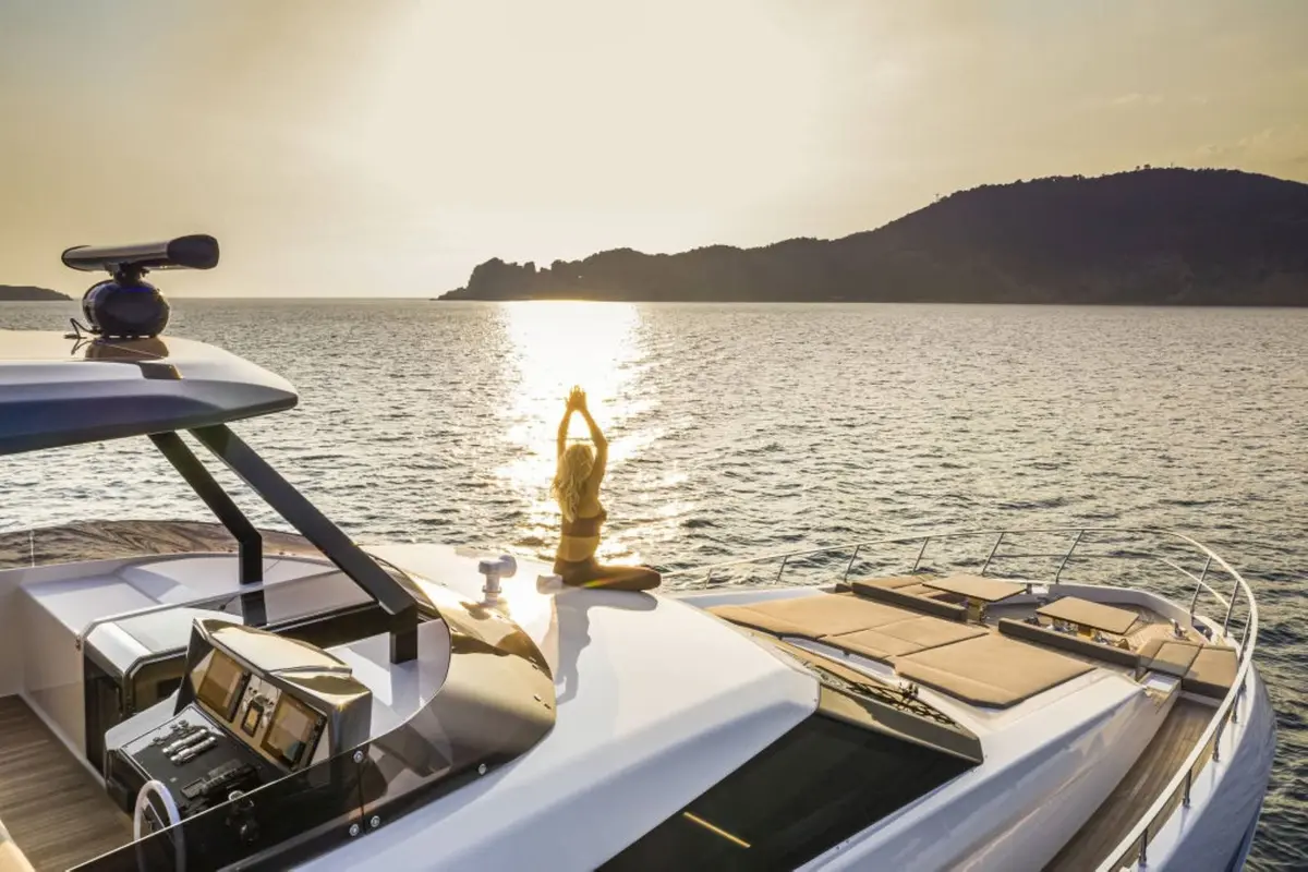 Ferretti 920, aft deck — Luxury Yachts St. Tropez, Saint-Tropez. Gulf anchorage mornings, Pampelonne tender runs by afternoon