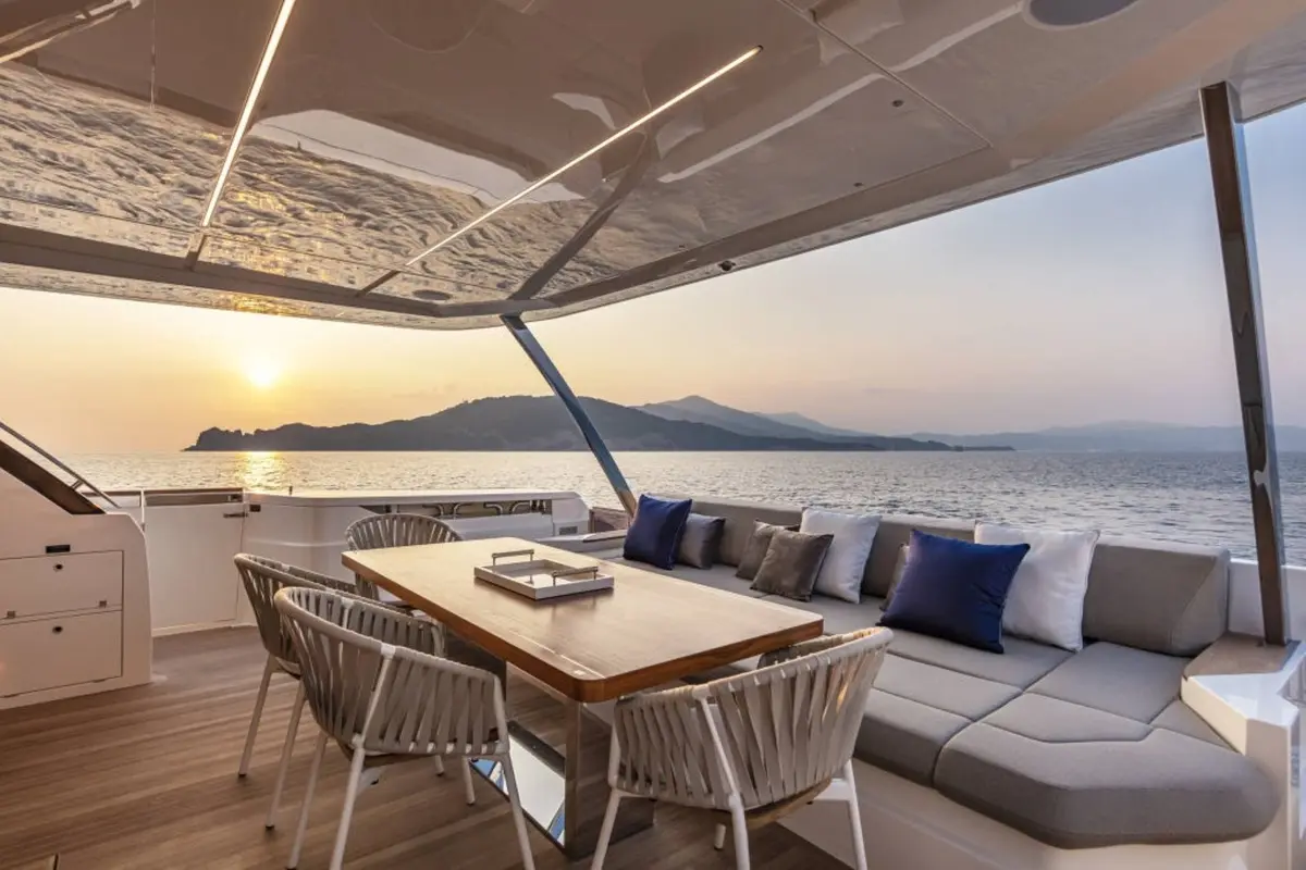 Ferretti 920, flybridge — Luxury Yachts St. Tropez, Saint-Tropez. Gulf anchorage mornings, Pampelonne tender runs by afternoon