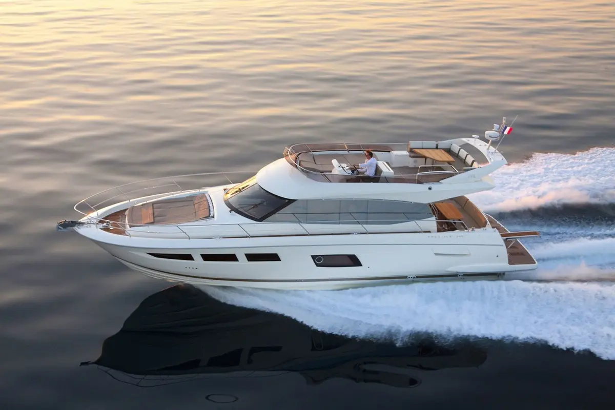 Prestige 550 FLY, exterior — Luxury Yachts St. Tropez, Saint-Tropez. A flybridge built for slow bays and short hops